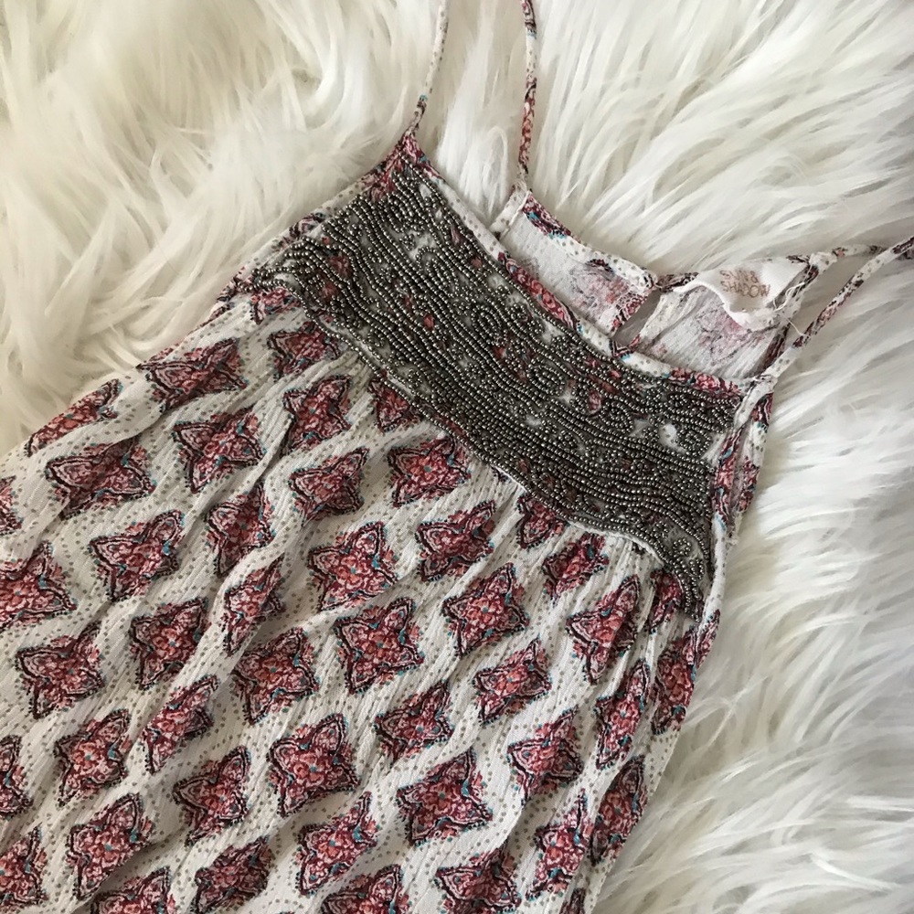 Sun and Shadow beaded ruffle hem dress